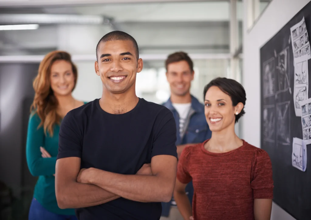 Nearshore team of business professionals collaborating in an office