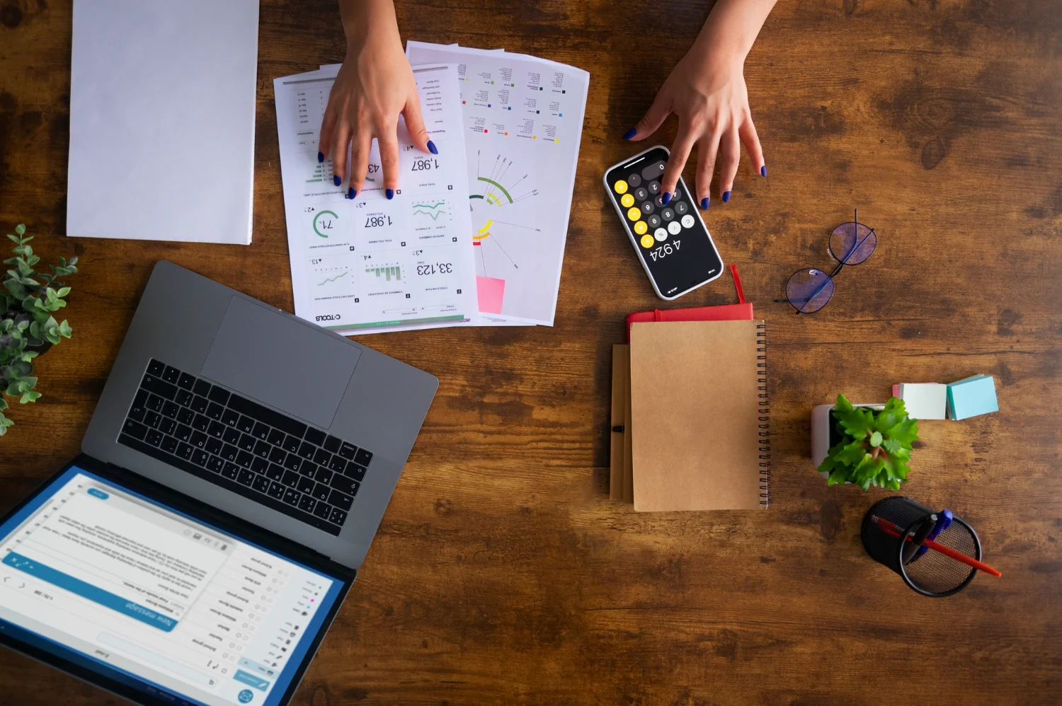Payroll professional reviewing compliance requirements and financial records