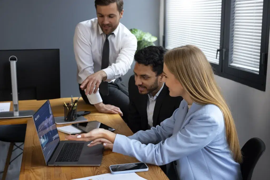 Insurance professional reviewing financial charts and claims data