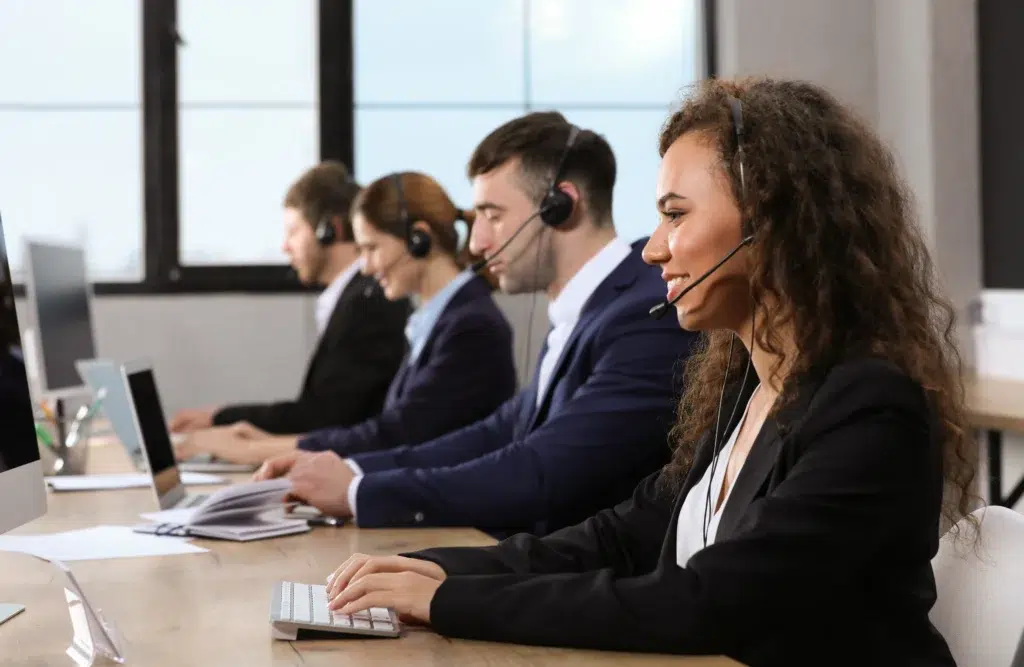 How Modern BPO Companies Are Integrating AI to Boost Human Productivity 1 A team of specialists at a modern nearshore business process outsourcing company delivering efficient service and technical support.