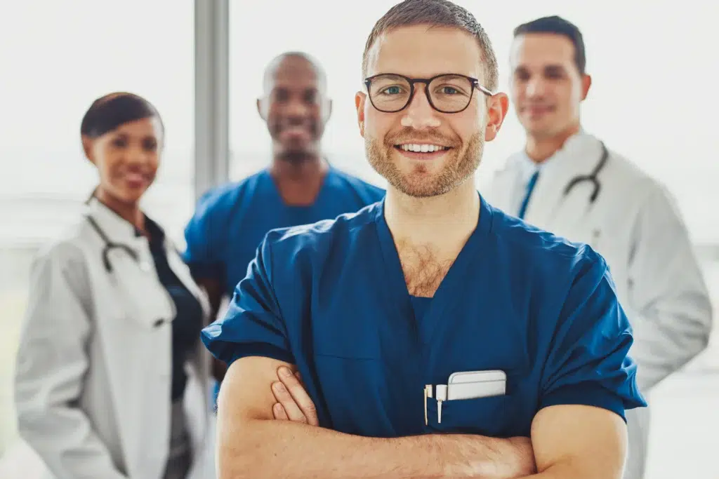 Medical Billing Services for Small Practices: Is It Time to Stop Doing It In-House? 1 Doctor leading a professional team of medical billing services for small practices.