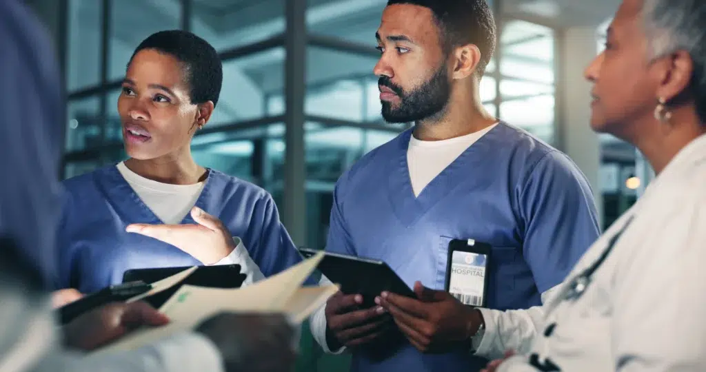 HIPAA Violations in Medical Billing: What Every Healthcare Decision-Maker Must Know Before Outsourcing 2 Medical team reviewing HIPAA violations protocols
