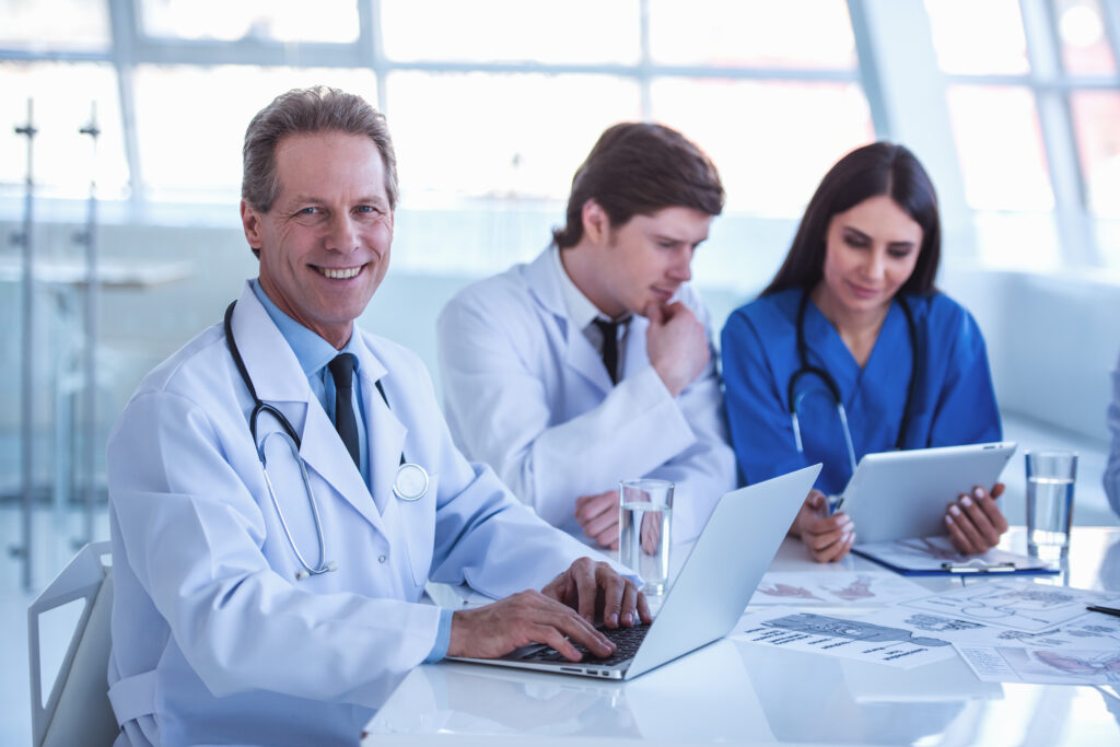 What Medical Billing Companies Do and How to Choose the Right One in 2026 1 Practice leaders comparing medical billing companies during a planning meeting