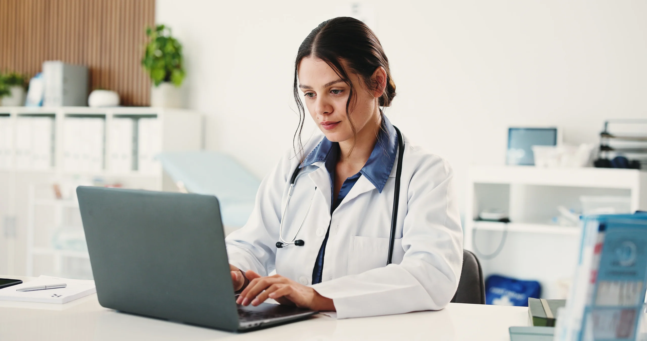 Healthcare professional handling patient scheduling and follow-up tasks