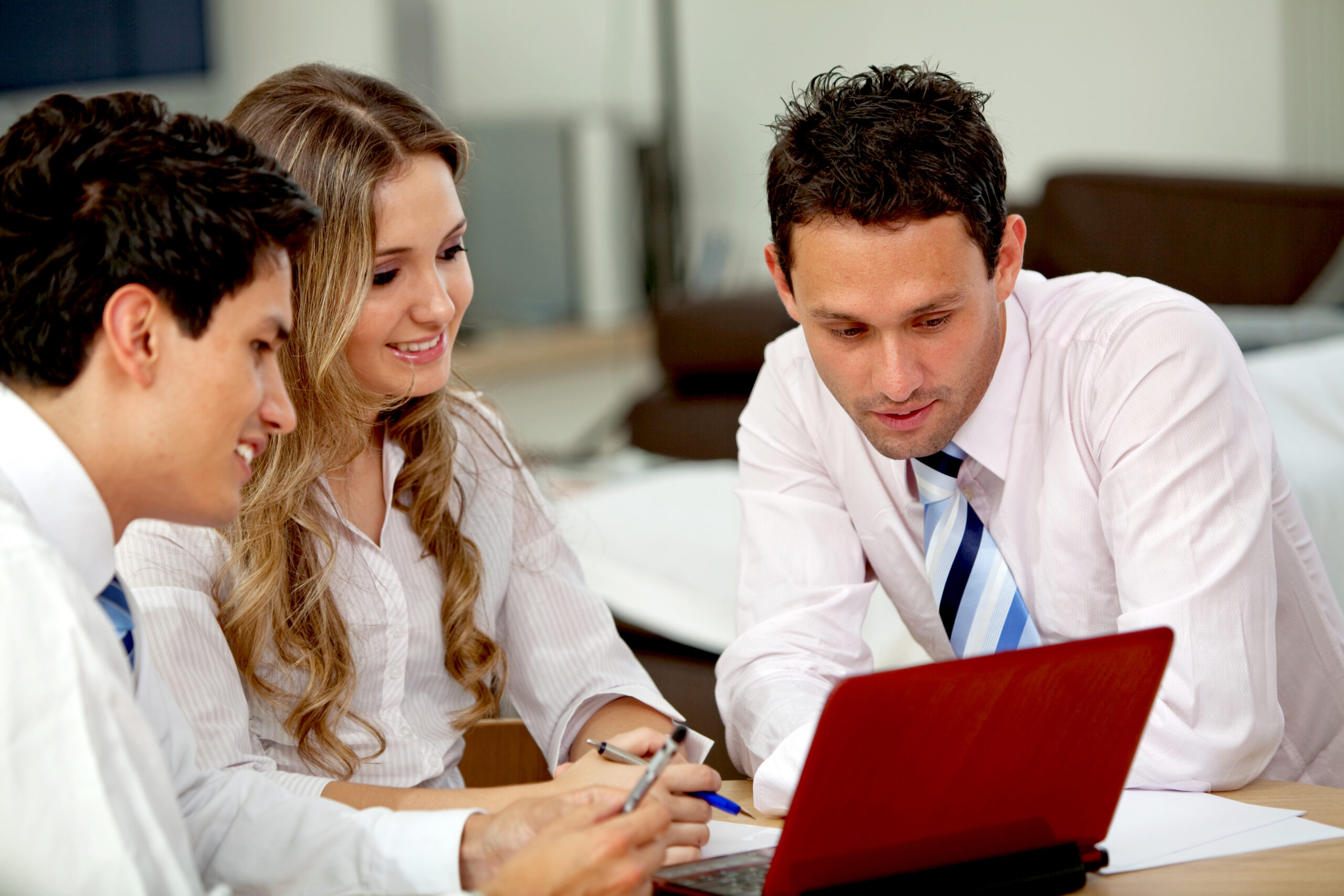 Practice leaders comparing medical billing companies during a planning meeting