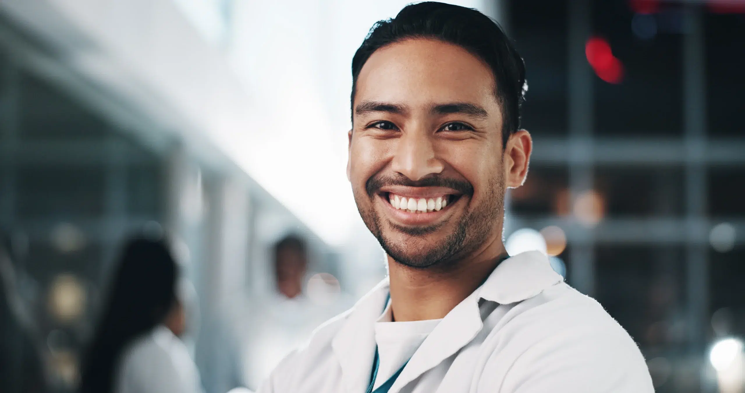 Physician in a modern hospital representing the human layer within revenue cycle management solutions