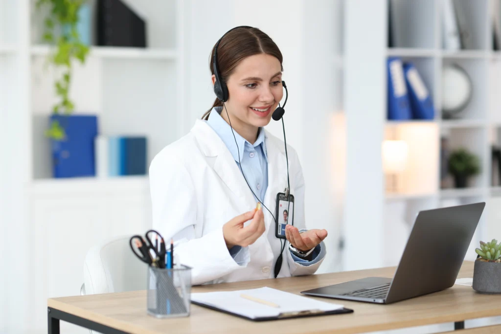 Healthcare professional wearing a headset during a patient consultation that qualifies for G2211 CPT code reimbursement