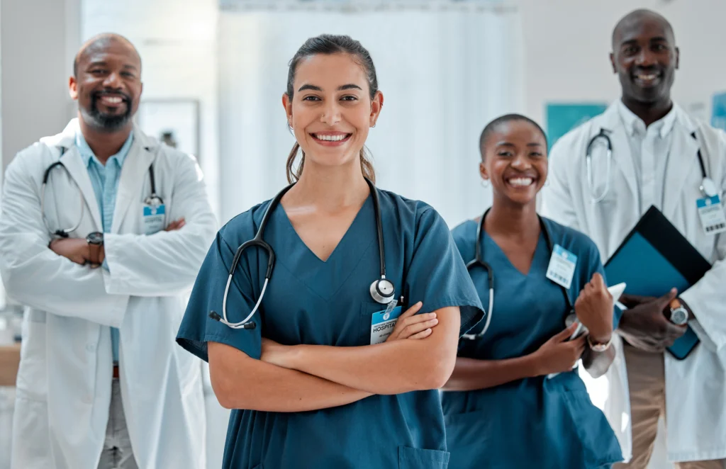 Diverse healthcare team reviewing new patient visit documentation requirements for 99205 CPT Code E/M coding in 2026