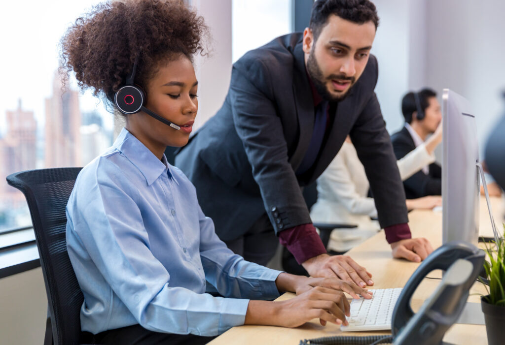 Still Think LATAM Outsourcing Isn't Good Enough? Here Is What the Data Actually Says 3 LATAM outsourcing specialist receiving real-time coaching while managing healthcare BPO operations for a U.S. partner