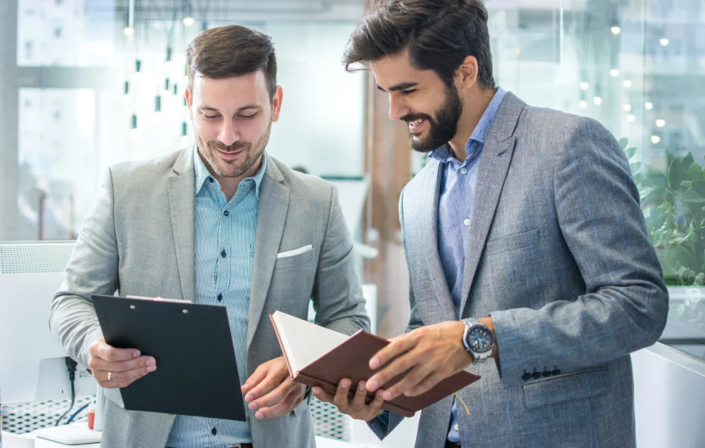 Business professionals representing a HIPAA compliant RCM outsourcing partner