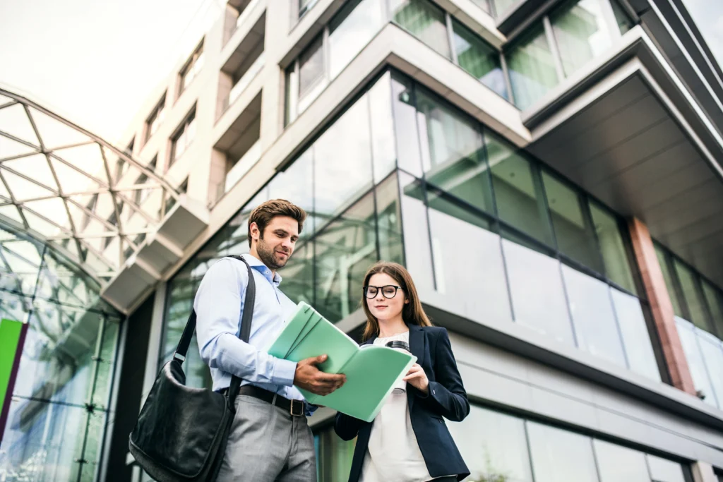 Business professionals representing a HIPAA compliant RCM outsourcing partner