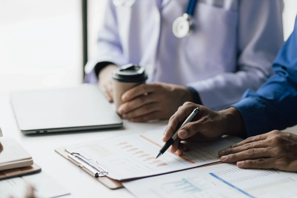 Healthcare professionals reviewing billing data as part of behavioral health revenue cycle management
