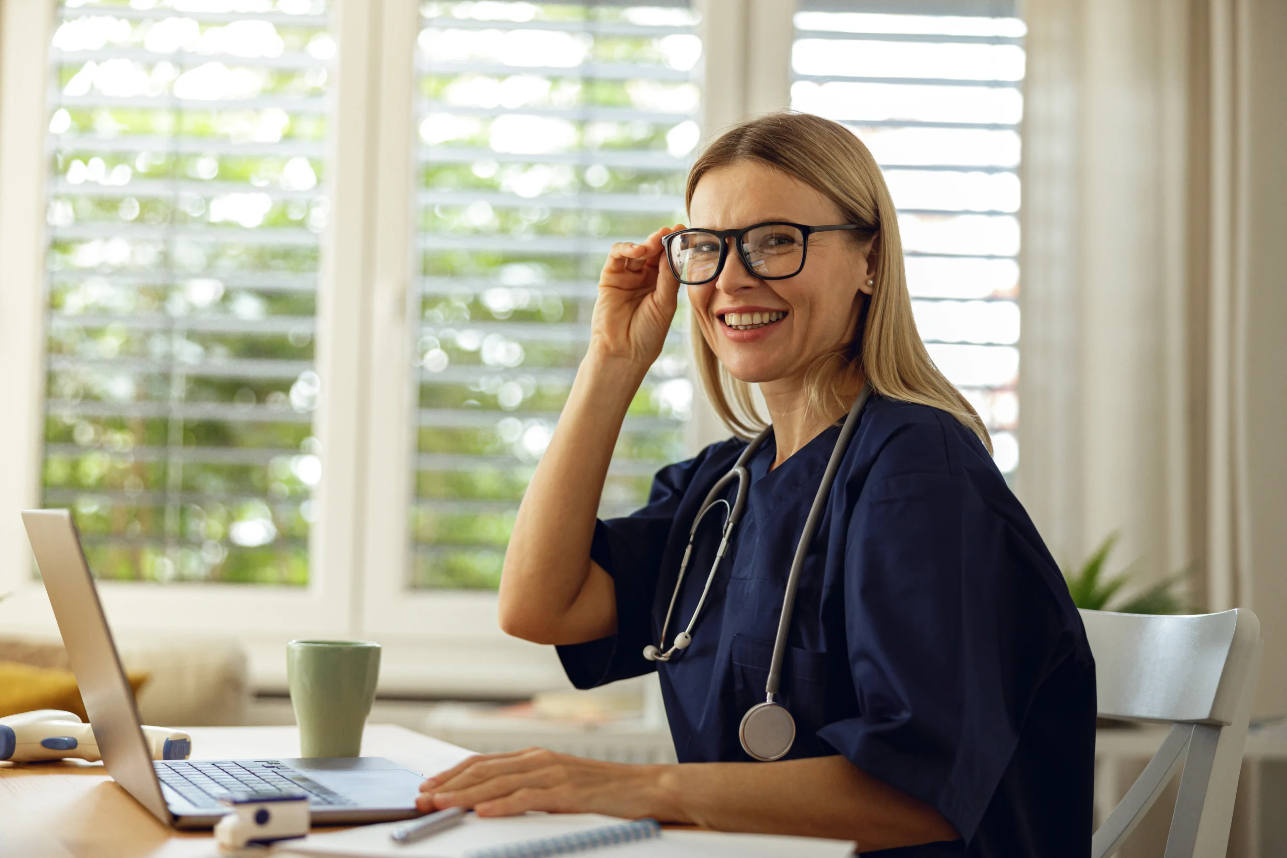 Doctor reviewing eligibility verification updates during an online session