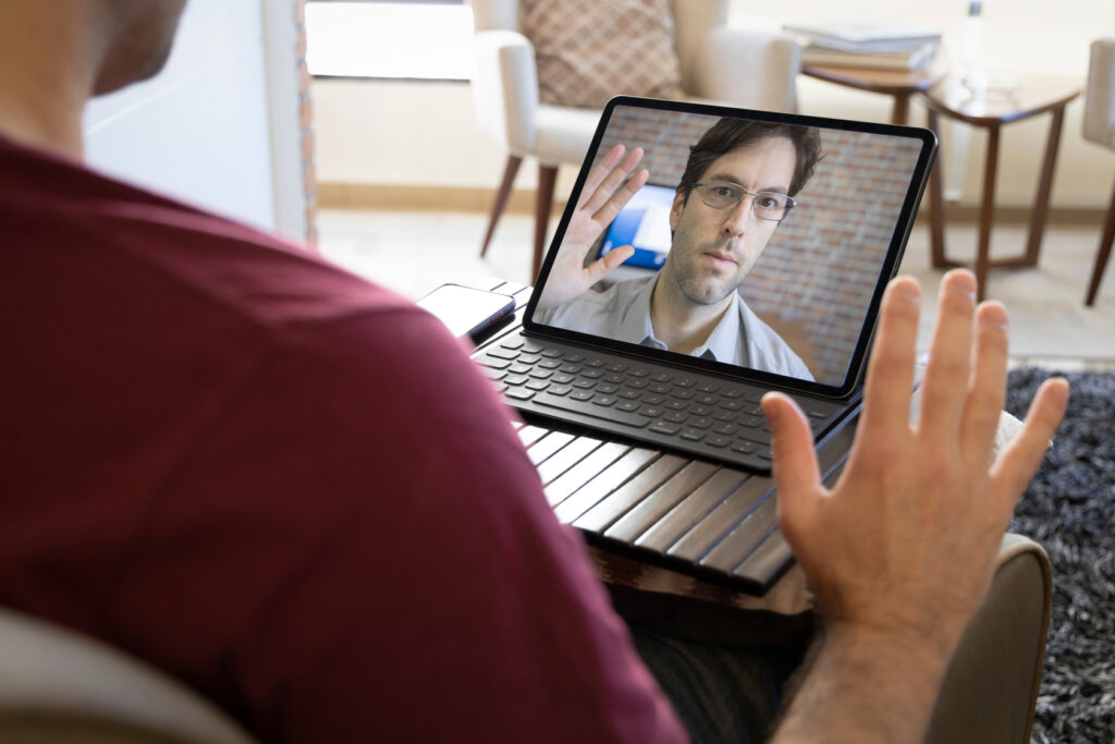 Telehealth Outsourcing: What the 2027 Medicare Extension Means for Your Practice 1 Elderly patient attending a telehealth visit supported by outsourced billing and scheduling