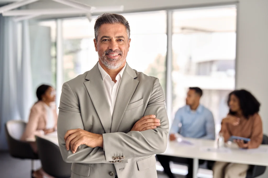 Confident business leader choosing a nearshore alternative to offshore staffing